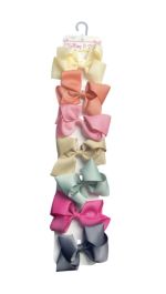 3.99 BUTTONS AND BOWS CLIPS 7 COUNT